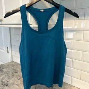 Good shape. Lululemon swiftly tech racerback tank 2.0 waist length, size 6